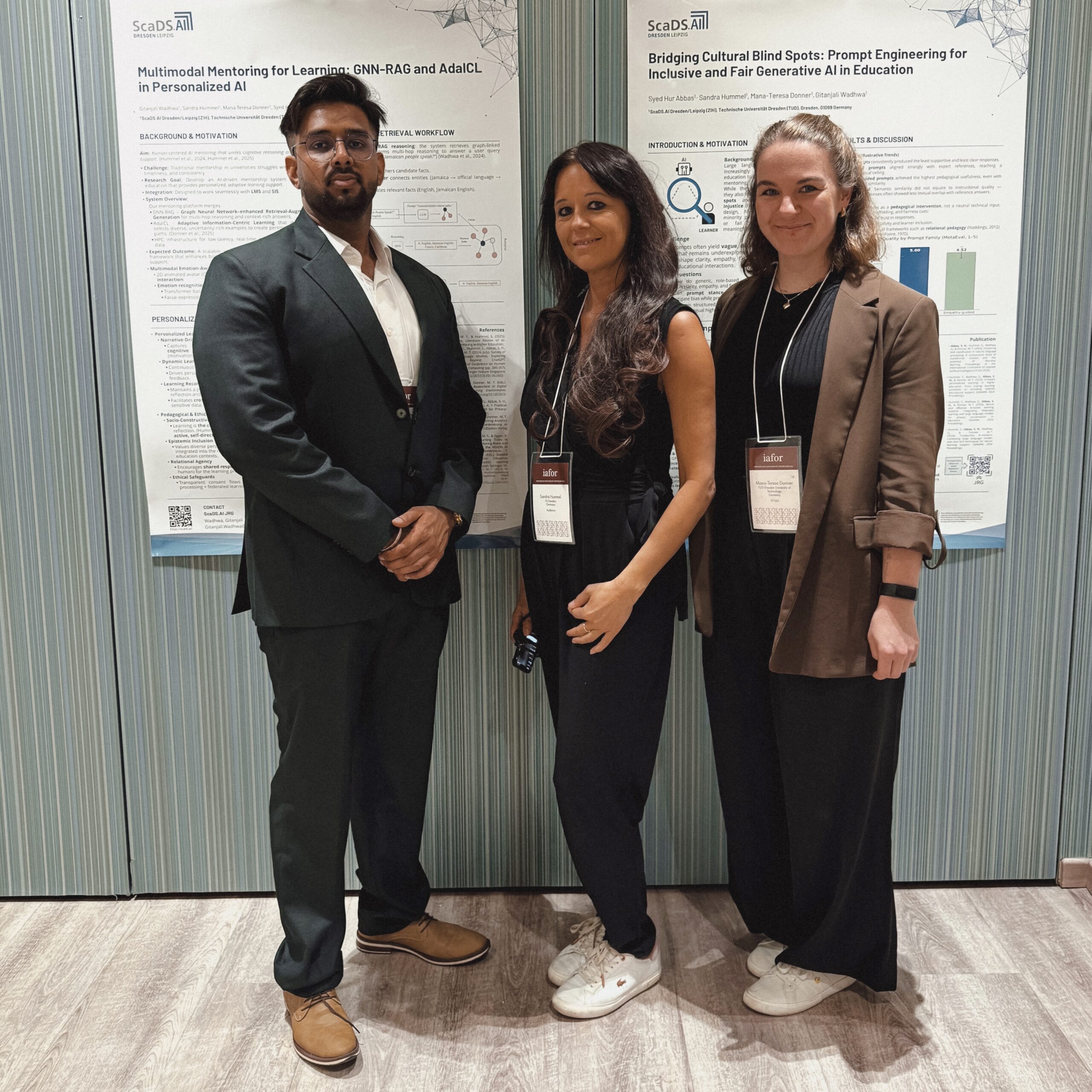 Photo. Syed Hur Abbas, Dr. Sandra Hummel and Mana-Teresa Donner are standing in front of the contributed posters at BCE2025.