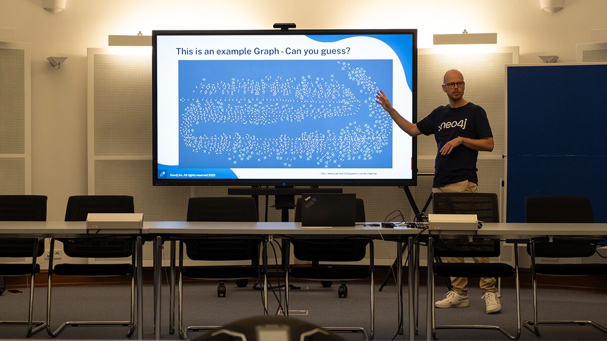 Photo. Dr. Christopher Rost presenting at the ScaDS.AI Meetup x Data Week 2025.