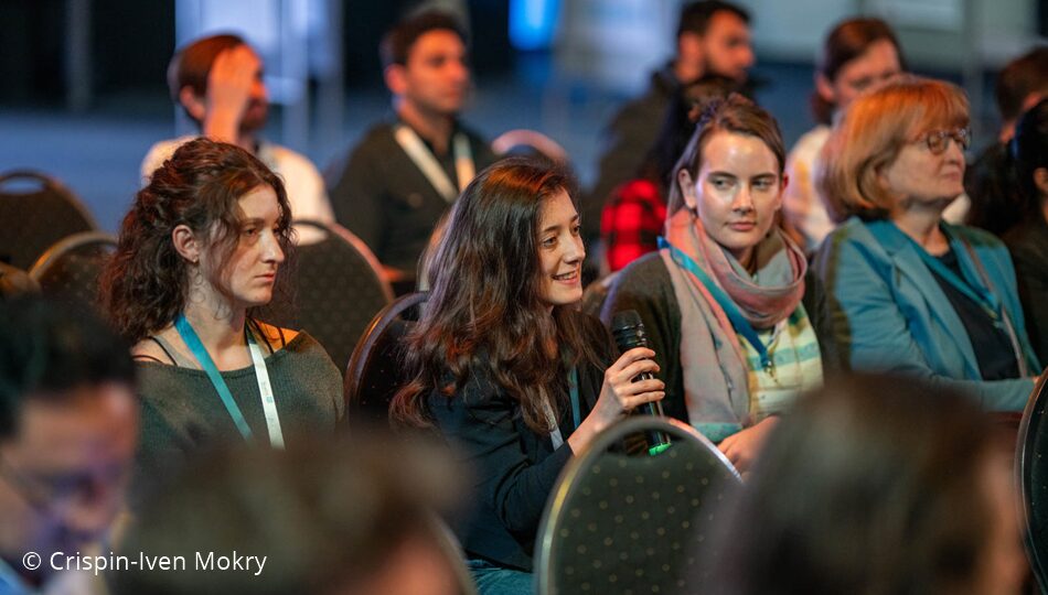 Photo. Participants of the All Hands Meeting of the German AI Community in 2024. © Crispin-Iven Mokry