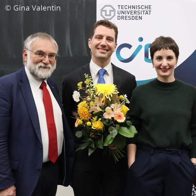 Photo. Prof. Dr. Wolfgang E. Nagel, Prof. Dr. Michael Färber - who is holding flowers -, and Lydia Lorenz.