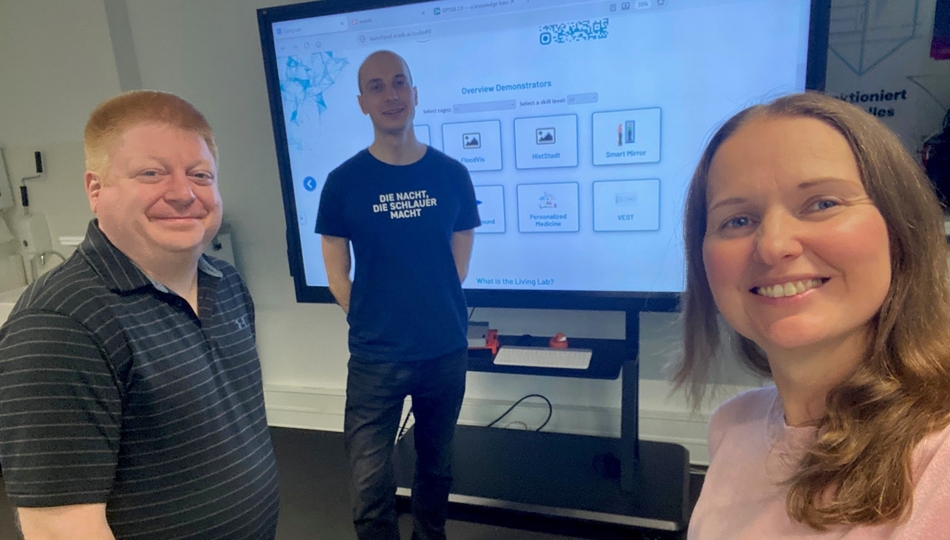 Photo. Prof. Matthew E. Taylor visits the Living Lab in Dresden together with Dr. Iryna Okhrin and Moritz Müller.