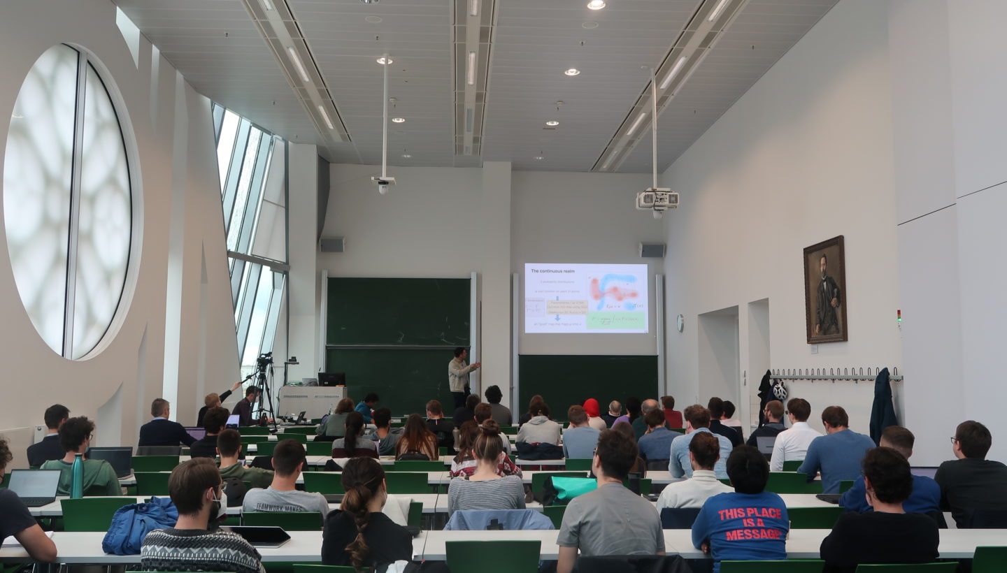 Photo. Session of the Colloquium Series at Leipzig University.