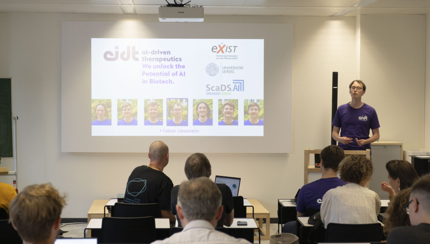 Photo. Fabian Liessmann introduces the team behind AI-DT.