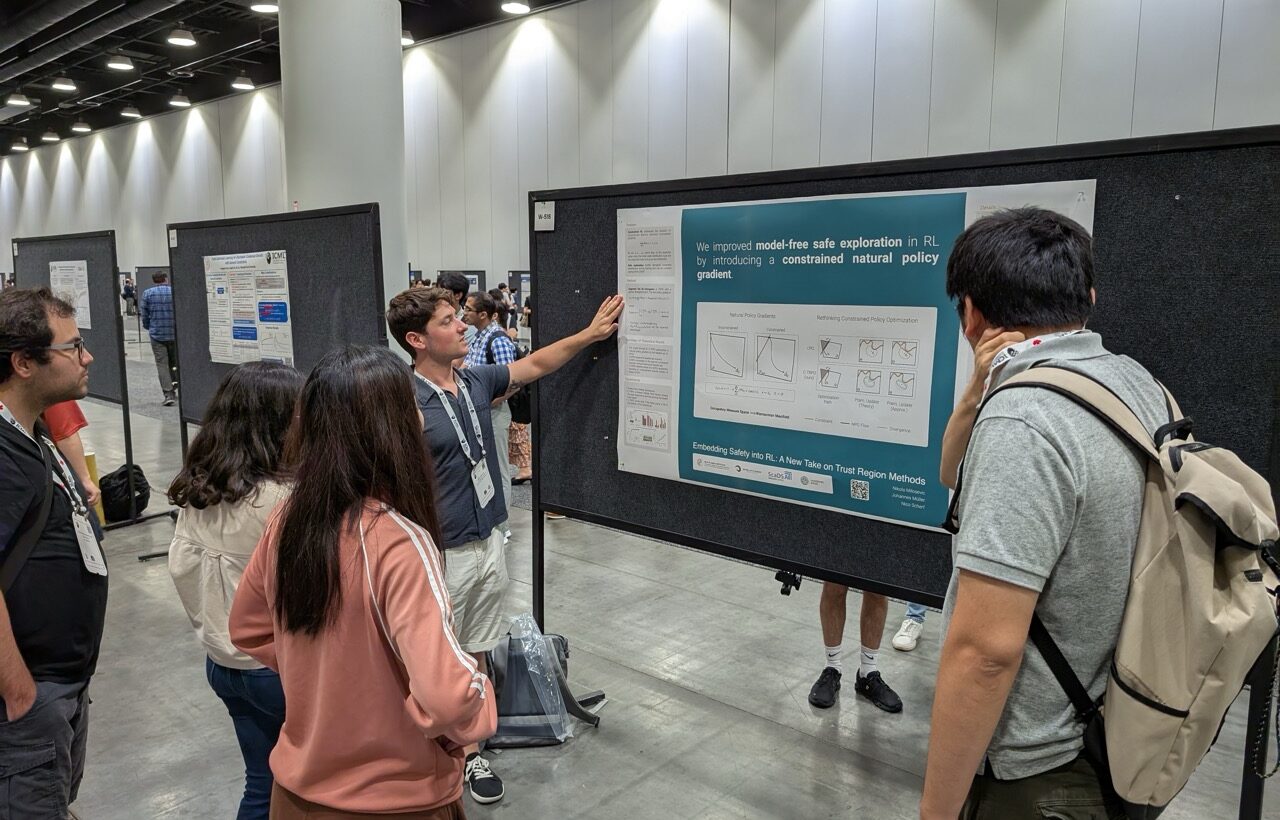 Photo. Nikola Milosevic presents his poster about trust region methods. Credits: Tom Bukic