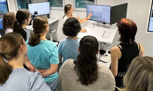 Photo. Dr. Iryna Okhrin is showcasing demos at the Living Lab to the participants of tryING 2025.