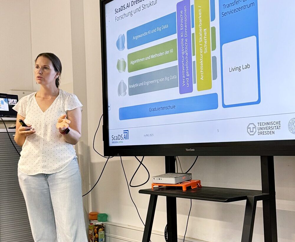 Photo. Dr. Iryna Okhrin is presenting the research areas and structure of ScaDS.AI Dresden/Leipzig.